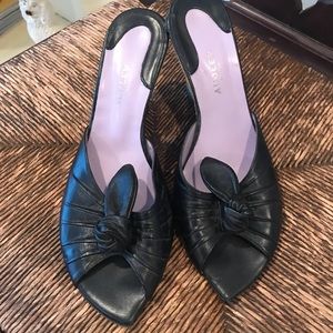 Audley London leather slides.